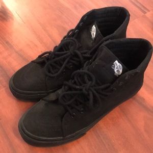 All black high top VANS
